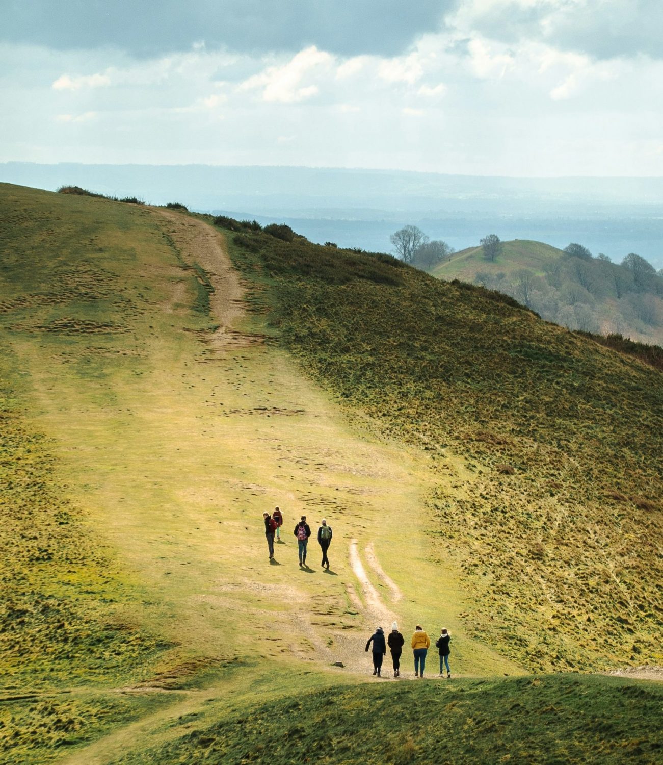 quadratisch_team_ unterwegs_alex-beauchamp-HLjp209tdDU-unsplash Kopie